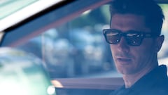 Bayern Munich's Polish forward Robert Lewandowski sits in a car as he leaves the Barmherzige Brueder hospital where he underwent a medical check prior to the start of his club's training session in Munich, southern Germany, on July 12, 2022. (Photo by Sven Hoppe / dpa / AFP) / Germany OUT