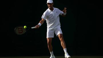 LONDON, ENGLAND - JUNE 28: Roberto Bautista Agut of Spain plays a forehand against Attila Balazs of Hungary during their Men's Singles First Round Match on day two of The Championships Wimbledon 2022 at All England Lawn Tennis and Croquet Club on June 28, 2022 in London, England. (Photo by Julian Finney/Getty Images)