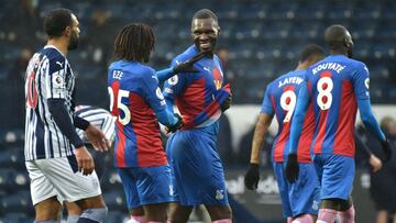 06 December 2020, England, West Bromwich: Crystal Palace's Christian Benteke celebrates scoring his side's fifth goal with teammates during the English Premier League soccer match between West Bromwich Albion and Crystal Palace at The Hawthorns