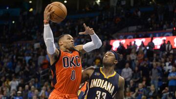 Nov 20, 2016; Oklahoma City, OK, USA; Oklahoma City Thunder guard Russell Westbrook (0) drives to the basket against Indiana Pacers center Myles Turner (33) during the fourth quarter at Chesapeake Energy Arena. Mandatory Credit: Mark D. Smith-USA TODAY Sports