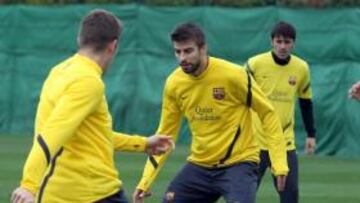 Piqué y Puyol trabajan con normalidad y reciben el alta