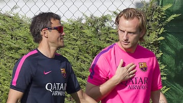 Rakitic y Luis Enrique.