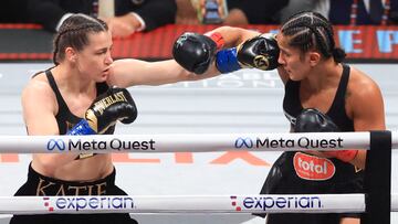 ARLINGTON, TEXAS - NOVEMBER 15: Katie Taylor (L) punches Amanda Serrano during their undisputed women's super lightweight title bout at AT&T Stadium on November 15, 2024 in Arlington, Texas. Christian Petersen/Getty Images/AFP (Photo by Christian Petersen / GETTY IMAGES NORTH AMERICA / Getty Images via AFP)