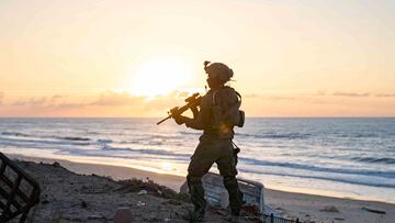 An Israeli soldier takes position during the ongoing ground operation of the Israeli army against Palestinian Islamist group Hamas, in a location given as Gaza, in this handout picture released on November 23, 2023. Israel Defense Forces/Handout via REUTERS THIS IMAGE HAS BEEN SUPPLIED BY A THIRD PARTY. REUTERS WAS NOT ABLE TO INDEPENDENTLY VERIFY THE LOCATION OR THE DATE THE PICTURE WAS TAKEN