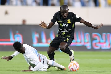 Ittihad's French forward #07 N'Golo Kante fights for the ball with Akhdoud's defender #04 Saeed Alrubaei during the Saudi Pro League football match between Al-Ittihad and Al-Akhdoud at Prince Hathloul bin Abdulaziz Stadium in Najran on September 14, 2023. (Photo by AFP)