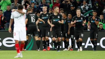 Soccer Football - Europa League - Group Stage - Group J - Krasnodar v Sevilla - Krasnodar Stadium, Krasnodar, Russia - October 4, 2018 Krasnodar's Mauricio Pereyra (hidden) celebrates scoring their first goal with team mates REUTERS/Maxim Shemetov