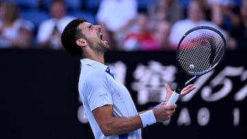 Melbourne (Australia), 23/01/2024.- Novak Djokovic of Serbia yells during his quarterfinal match against Taylor Fritz of USA at the 2024 Australian Open in Melbourne, Australia, 23 January 2024. (Tenis) EFE/EPA/LUKAS COCH AUSTRALIA AND NEW ZEALAND OUT
