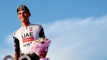 Second placed UAE Team Emirates XRG's Mexican rider Isaac Del Toro celebrates on the podium at the end of the 21st and last stage of the 108th Giro d'Italia cycling race of 143kms from Rome to Rome on June 1, 2025. (Photo by Luca Bettini / AFP)