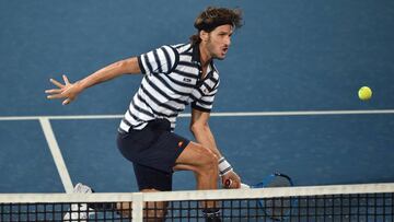 Feliciano L¨®pez avanza a octavos y David Ferrer pierde