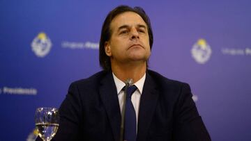 Uruguay's President Luis Lacalle Pou gestures during a press conference in Montevideo on October 22, 2020, amid the new coronavirus pandemic. - Lacalle Pou said that Uruguay's borders will remain closed -with exceptions- during the summer season. (Photo by Pablo PORCIUNCULA / AFP)