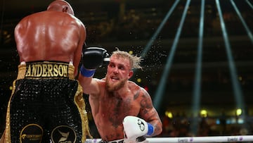 Oct 29, 2022; Glendale, Arizona, USA; Jake Paul moves in with a hit against Anderson Silva at Desert Diamond Arena. Mandatory Credit: Mark J. Rebilas-USA TODAY Sports