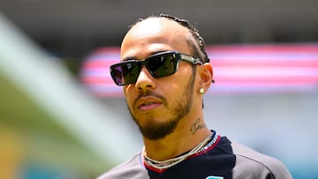 MIAMI, FLORIDA - MAY 02: Lewis Hamilton of Great Britain and Mercedes looks on in the Paddock during previews ahead of the F1 Grand Prix of Miami at Miami International Autodrome on May 02, 2024 in Miami, Florida.   Clive Mason/Getty Images/AFP (Photo by CLIVE MASON / GETTY IMAGES NORTH AMERICA / Getty Images via AFP)