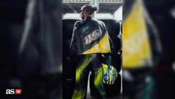 F1 driver Lewis Hamilton showed his love for late Brazilian driver Ayrton Senna by wearing a neon green and yellow suit with his photo on the back.