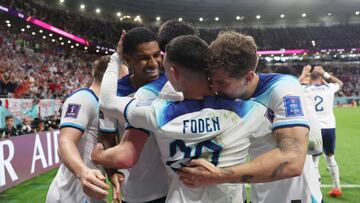 DOHA, QATAR - NOVEMBER 29: Phil Foden of England celebrates with teammates after scoring their team's second goal during the FIFA World Cup Qatar 2022 Group B match between Wales and England at Ahmad Bin Ali Stadium on November 29, 2022 in Doha, Qatar. (Photo by Alex Pantling - The FA/The FA via Getty Images)