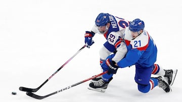 Milano Cortina 2026 Olympics - Ice Hockey - Men's Play-offs Semifinals - United States vs Slovakia - Milano Santagiulia Ice Hockey Arena, Milan, Italy - February 20, 2026. Brock Nelson of United States in action with Adam Ruzicka of Slovakia REUTERS/David W Cerny TPX IMAGES OF THE DAY