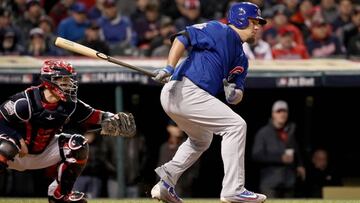 CLEVELAND, OH - OCTOBER 26: Kyle Schwarber #12 of the Chicago Cubs hits an RBI single to score Ben Zobrist #18 (not pictured) during the fifth inning against the Cleveland Indians in Game Two of the 2016 World Series at Progressive Field on October 26, 2016 in Cleveland, Ohio. Ezra Shaw/Getty Images/AFP
== FOR NEWSPAPERS, INTERNET, TELCOS & TELEVISION USE ONLY ==