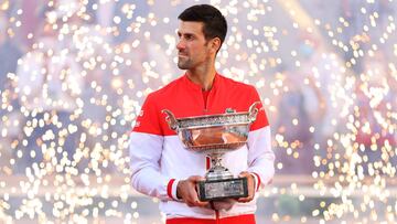 PARIS, FRANCE - JUNE 13: Novak Djokovic of Serbia celebrates as he holds the trophy after winning his Men's Singles Final match against Stefanos Tsitsipas of Greece during Day Fifteen of the 2021 French Open at Roland Garros on June 13, 2021 in Paris