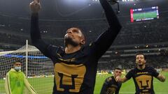 Pumas&#039; Higor Meritao celebrates after scoring against America during the Mexican Apertura tournament quarter finals football match at the Aztecs Stadium in Mexico City, on November 27, 2021. (Photo by CLAUDIO CRUZ / AFP)