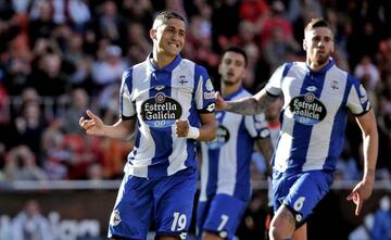 Fajr (left) looks dejected after seeing his penalty saved by Alves.