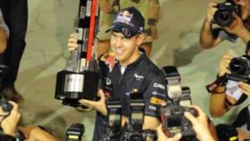 <b>EL GRAN PROTAGONISTA. </b>Vettel celebró la victoria en Singapur y tiene el título en el bolsillo.
