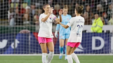 Sep 30, 2023; Portland, Oregon, USA; San Diego Wave FC forward Alex Morgan (13) celebrates her goal against the Portland Thorns FC with defender Christen Westphal (20) during the first half at Providence Park. Mandatory Credit: Soobum Im-USA TODAY Sports