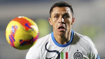 Alexis Sanchez of Inter Milan watches the ball during the Serie A soccer match between Atalanta and Inter at Gewis Stadium, Bergamo, Italy, Sunday Jan. 16, 2022. (Spada/LaPresse via AP)