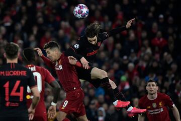 Roberto Firmino y Sime Vrsaljko.