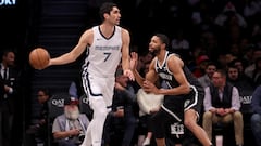 Mar 4, 2024; Brooklyn, New York, USA; Memphis Grizzlies forward Santi Aldama (7) controls the ball against Brooklyn Nets forward Mikal Bridges (1) during the first quarter at Barclays Center. Mandatory Credit: Brad Penner-USA TODAY Sports