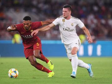 Real Madrid's Luka Jovic in action with AS Roma's Juan Jesus.