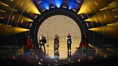 Members of the band "Kalush Orchestra" perform on behalf of Ukraine during the first semifinal of the Eurovision Song contest 2022 on May 10, 2022 at the Palalpitour venue in Turin. (Photo by Marco BERTORELLO / AFP) (Photo by MARCO BERTORELLO/AFP via Getty Images)