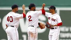 BOSTON, MASSACHUSETTS - JULY 18: Marco Hernandez #40, Xander Bogaerts #2 and Mookie Betts #50 of the Boston Red Sox celebrate after the victory over the Toronto Blue Jays at Fenway Park on July 18, 2019 in Boston, Massachusetts.   Omar Rawlings/Getty Images/AFP
 == FOR NEWSPAPERS, INTERNET, TELCOS &amp; TELEVISION USE ONLY ==