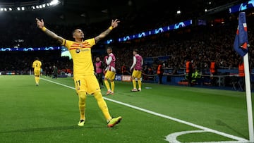 Barcelona's Brazilian forward #11 Raphinha celebrates after scoring Barcelona's second goal during the UEFA Champions League quarter final first leg football match between Paris Saint-Germain (PSG) and FC Barcelona at the Parc des Princes stadium in Paris on April 10, 2024. (Photo by FRANCK FIFE / AFP)