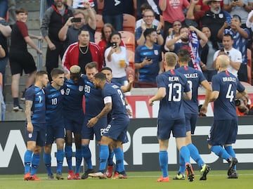 Mar 26, 2019; Houston, TX, USA; United States of America midfielder Christian Pulisic (10) celebrates his goal with teammates against Chile in the first half during an international friendly soccer match at BBVA Compass Stadium. Mandatory Credit: Thomas B. Shea-USA TODAY Sports