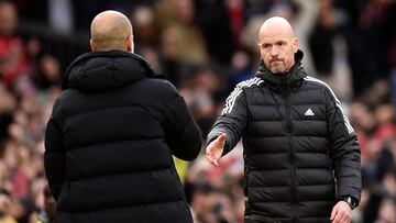 Manchester United's Dutch manager Erik ten Hag (R) shakes hands with Manchester City's Spanish manager Pep Guardiola after the English Premier League football match between Manchester United and Manchester City at Old Trafford in Manchester, north west England, on January 14, 2023. (Photo by Oli SCARFF / AFP) / RESTRICTED TO EDITORIAL USE. No use with unauthorized audio, video, data, fixture lists, club/league logos or 'live' services. Online in-match use limited to 120 images. An additional 40 images may be used in extra time. No video emulation. Social media in-match use limited to 120 images. An additional 40 images may be used in extra time. No use in betting publications, games or single club/league/player publications. / 