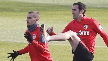 Griezmann y Godín, en un entrenamiento.
