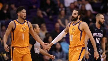 PHOENIX, ARIZONA - JANUARY 10: Devin Booker #1 and Ricky Rubio #11 of the Phoenix Suns high five after scoring against the Orlando Magic during the first half of the NBA game at Talking Stick Resort Arena on January 10, 2020 in Phoenix, Arizona. NOTE TO USER: User expressly acknowledges and agrees that, by downloading and or using this photograph, user is consenting to the terms and conditions of the Getty Images License Agreement. Mandatory Copyright Notice: Copyright 2020 NBAE.   Christian Petersen/Getty Images/AFP
 == FOR NEWSPAPERS, INTERNET, TELCOS &amp; TELEVISION USE ONLY ==