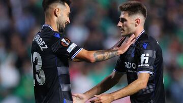 Real Sociedad's Spanish midfielder Brais Mendez (L) celebrates with a teammate after scoring the second goal during the UEFA Europa League group E football match between Cyprus' Omonia Nicosia and Spain's Real Sociedad at GSP stadium in the capital Nicosia on October 6, 2022. (Photo by AFP)