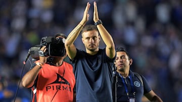 Cruz Azul's coach Martin Anselmi greets supporters after their victory over Monterrey during the Mexican Clausura tournament semifinal second leg football match between Cruz Azul and Monterrey at the Ciudad de los Deportes stadium in Mexico City on May 19, 2024. (Photo by CARL DE SOUZA / AFP)