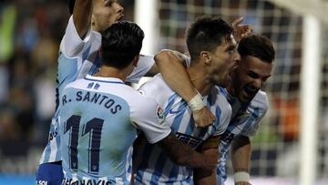 El Málaga respira en un partido bravo con nueve amarillas y dos rojas