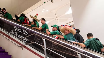 LUSAIL CITY, QATAR - NOVEMBER 30: Fans of Mexico arrive at Lusail Metro Stadium before the FIFA World Cup Qatar 2022 Group C match between Saudi Arabia and Mexico at Lusail Stadium on November 30, 2022 in Lusail City, Qatar. (Photo by Matthew Ashton - AMA/Getty Images)