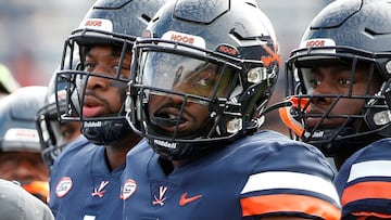 University of Virginia's NCAA football team Virginia Cavaliers linebacker D'Sean Perry, who was killed in a shooting attack on a bus full of students, looks on from the field during a stoppage in play in the first half against the Pittsburgh Panthers at Scott Stadium in Charlottesville, Virginia November 12, 2022. Mandatory Credit: Amber Searls-USA TODAY Sports via REUTERS  NO RESALES. NO ARCHIVES. MANDATORY CREDIT