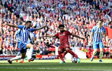 Mohamed Salah scores his 32nd league of the campaign against Brighton, setting a new Premier League record.