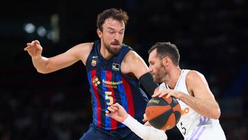 SEVILLE, SPAIN - SEPTEMBER 25: Rudy Fernandez of Real Madrid battles for the ball with Sertac Sanli reacts during the Supercopa Endesa final match between Real Madrid and FC Barcelona on September 25, 2022 in Seville, Spain. (Photo by Fran Santiago/Getty Images)