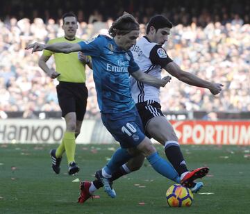 Modric and Guedes.