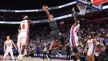 Paolo Banchero #5 of the Orlando Magic tries to dunk on Isaiah Stewart #28 of the Detroit Pistons in the first half during game one of the first round of the eastern conference playoffs at Little Caesars Arena on April 19, 2026 in Detroit, Michigan.