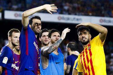 Sergio Busquets, MEssi y Luis Suárez.