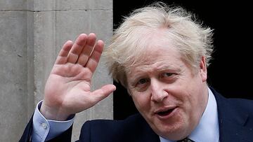 (FILES) In this file photo taken on March 18, 2020 Britain's Prime Minister Boris Johnson leaves 10 Downing Street in central London. - Britain's Prime Minister Boris Johnson appeared to be on the road to recovery as Downing Street said the Prime Minister had returned to the ward at St Thomas' Hospital after spending three nights in the intensive care unit. (Photo by Adrian DENNIS / AFP)