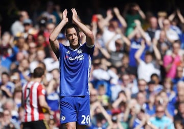 Chelsea captain John Terry applauds the Chelsea fans after being substituted on 26 minutes.