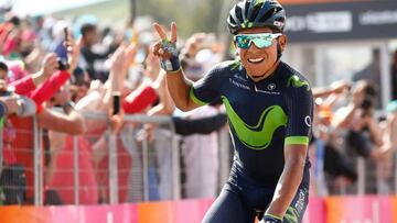 Colombia's Nairo Quintana of team Movistar celebrates as he crosses the finish line to win the 9th stage of the 100th Giro d'Italia, Tour of Italy, cycling race from Montenero di Bisaccia to Blockhaus on May 14, 2017. / AFP PHOTO / Luk BENIES