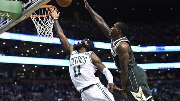 Dec 4, 2017; Boston, MA, USA; Boston Celtics guard Kyrie Irving (11) drives to the basket past Milwaukee Bucks guard Eric Bledsoe (6) during the second half at TD Garden. Mandatory Credit: Bob DeChiara-USA TODAY Sports